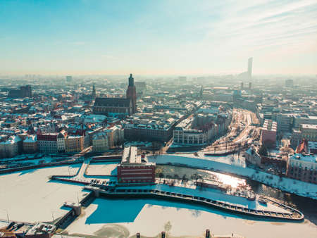 Wroclaw, Poland 02.15.2021 - Drone footage of snow-covered streets in the city of Wroclaw, Poland. Winter season . High quality photoのeditorial素材