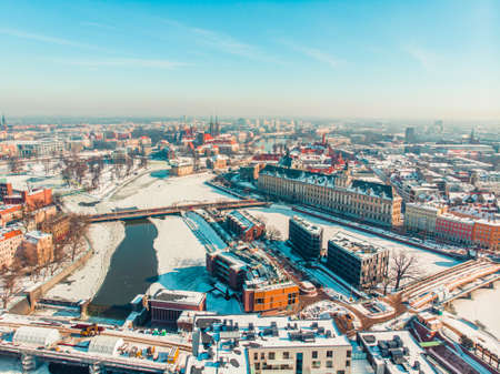 Wroclaw, Poland 02.15.2021 - Panoramic footage of snow-covered streets in the city of Wroclaw, Poland . High quality photoのeditorial素材