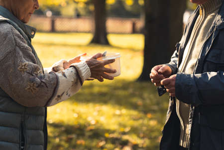 Concept of sharing food with people in need. High quality photoの写真素材