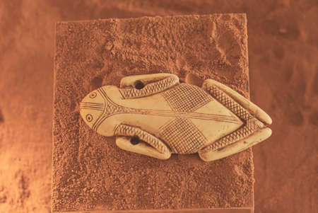 09.03.2021 Warsaw, Poland. Astonishing frog or lizard creature made of ivory in an exhibition in a...