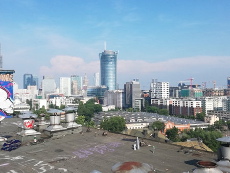 06.03.2018 Warsaw, Poland. Urban jungle concept. Blocks of flats, modern skyscrapers, Warsaw Spire. High quality photoのeditorial素材