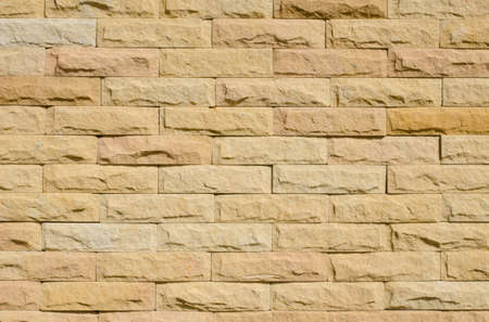 close up sand stone brick wallの写真素材
