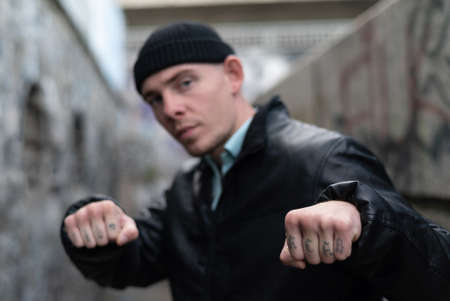 ACAB tattoo on the arm of a bully manの写真素材