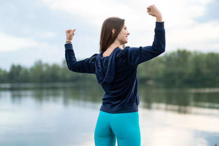 Portrait of a beautiful young sporty brunette girlの写真素材