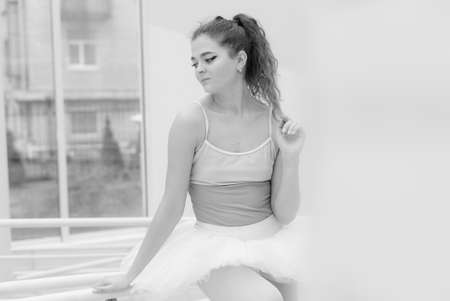 Black and white photo of flexible slender young girl ballerina. BWの写真素材