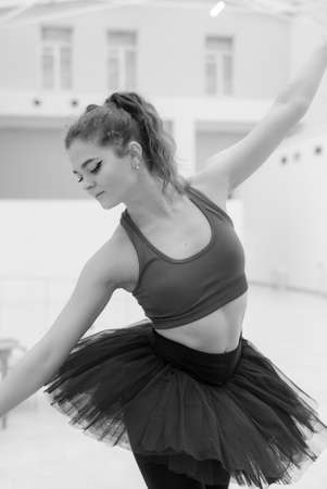 Black and white photo of flexible slender young girl ballerina. BWの写真素材
