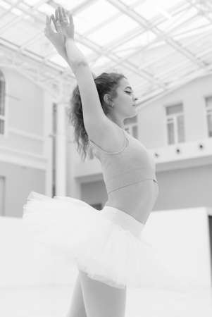 Black and white photo of flexible slender young girl ballerina. BWの写真素材