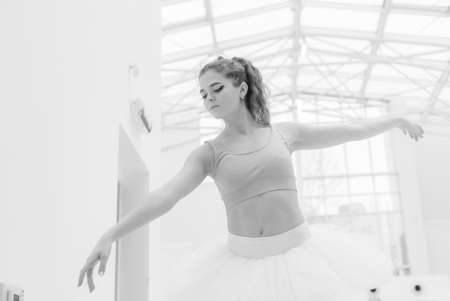 Black and white photo of flexible slender young girl ballerina. BWの写真素材