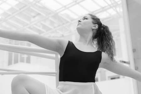 Black and white photo of flexible slender young girl ballerina. BWの写真素材