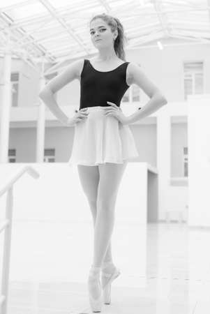 Black and white photo of flexible slender young girl ballerina. BWの写真素材