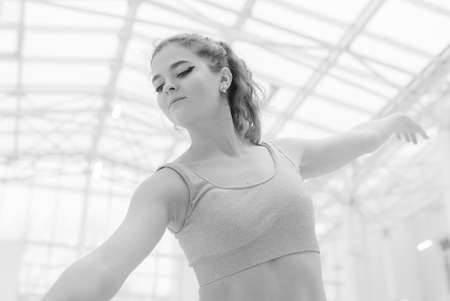 Black and white photo of flexible slender young girl ballerina. BWの写真素材