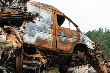 Consequences of the war in Ukraine - destroyed cars in Irpin, Bucha district.
