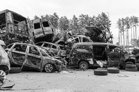 Shot and burned cars during the war in Ukraine, black and white photoの写真素材