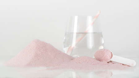 Natural strawberry collagen protein powder for skin regeneration. Plant based. Hydrolyzed. The concept of food additives.の写真素材