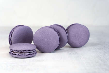 Macaroons are delicious french cookies. Purple macaroons. A great gift idea for 8 March - International Womens Day. Copy space. Selective focusの写真素材