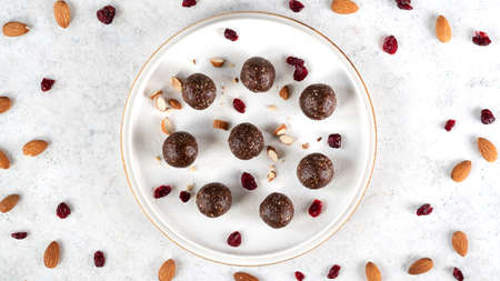 Step by step cooking Energy balls. Step 11 recipe of no bake energy balls. Homemade healthy raw vegetarian dessert is ready to eat. Healthy eating. Enjoy your meal. Flat lay.の写真素材