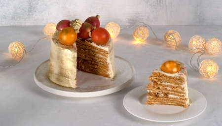 Christmas cake decorated with figures. Color of the year 2021. Selective focus.