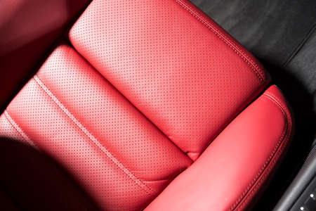 Close up of red leather car seatの写真素材