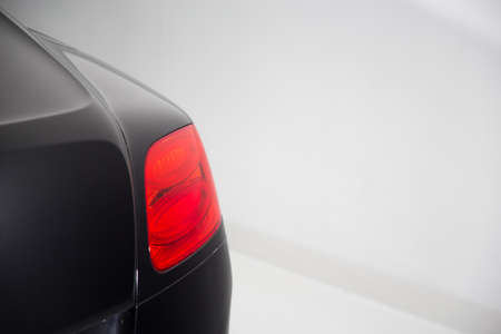 Close up of rear light on silver sports carの写真素材