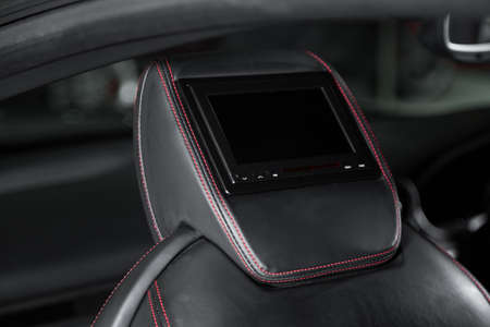 Close up shot of a media screen on a car headrestの写真素材