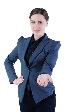 Smiling businesswoman showing open hand palm with copy space for some product or slogan. Advertisement concept.の写真素材
