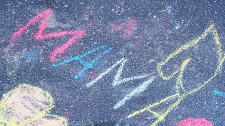 Word mama by chalk on the asphalt. Family concept.の写真素材