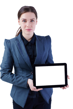 Smiling businesswoman holding digital tablet with blank screen. Isolated on white.の写真素材