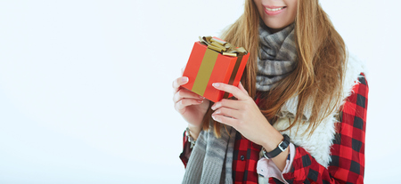 Portrait young happy woman with gift box in hands.の写真素材