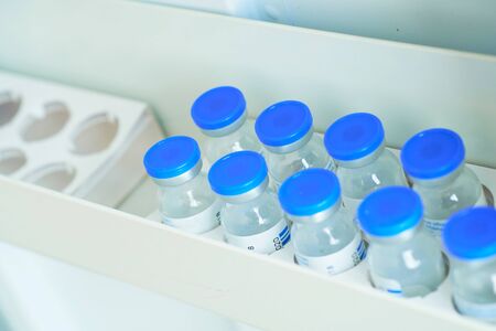 Packaging of drugs for dilution of the dropper Antibiotic drug resistance. Blurry background...