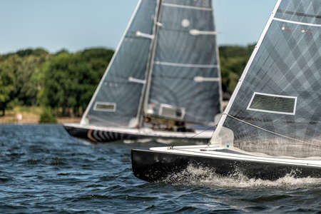 classic sailing yacht sailing on a lake during a regatta