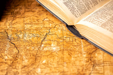 old expedition map with oldfashioned book