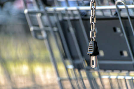 queue of shopping carts in a shopping mallの写真素材