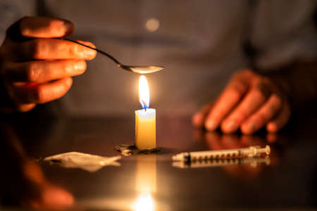 injection, candle and Heroine of a junkieの写真素材