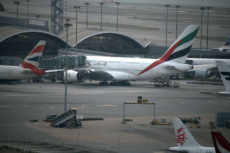 Hong Kong, China - March 25th 2018 : Emirates aircraft parked at the bay in Hong Kong for...