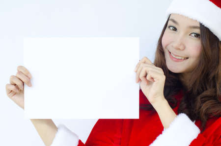 A Beautiful Asian santa woman in red cloth with copyspace 