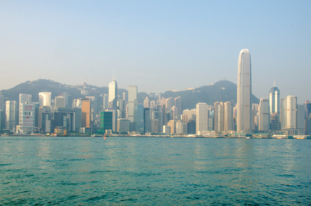HONG KONG - OCTOBER 22 : Hong Kong Victoria Harbor October 22 2013. Victoria Harbour is a natural landform harbour situated between Hong Kong Island and the Kowloon Peninsula in Hong Kongのeditorial素材