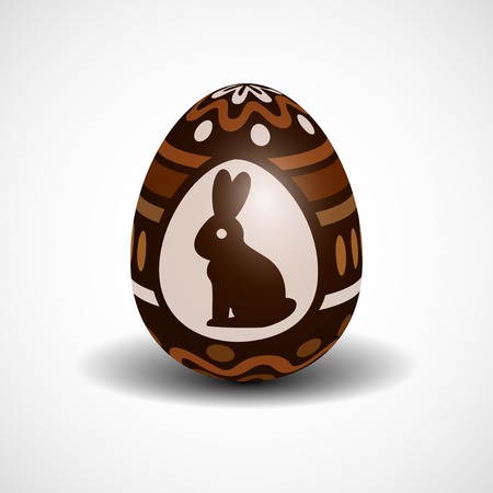 realistic chocolate Easter egg with ornament and rabbit. vector illustration.のイラスト素材