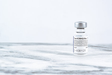 MOSCOW, RUSSIA - MARCH 12 2021: Coronavirus Covid 19 vaccine Sputnik V local name GamCovidVac produced in Russia and ready for shipmentのeditorial素材