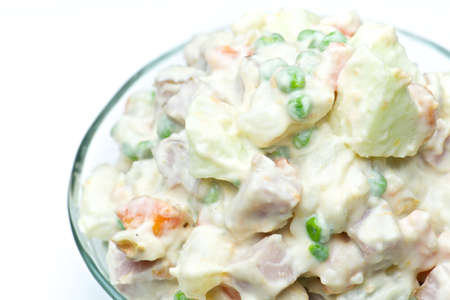 Close-up of a bowl of fresh Russian saladの写真素材