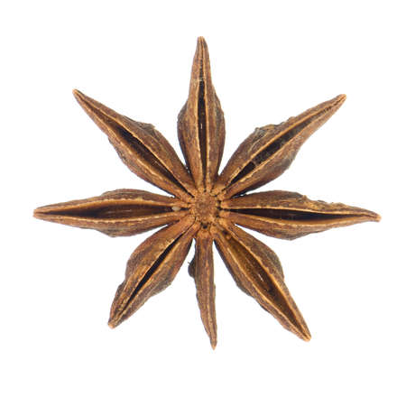 Closeup overview of star anise isolated on whiteの写真素材
