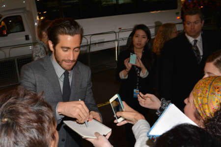 TORONTO - SEPTEMBER 6: Actor Jake Gyllenhaal signs autographs at the Toronto International Film Festival for his new film Prisoners on September 6, 2013.のeditorial素材