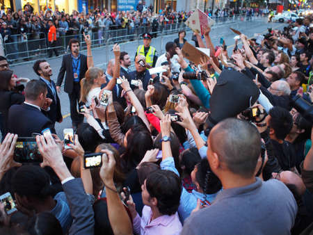 TORONTO - SEPTEMBER 9: Singer Taylor Swift signs autograph for fans at the Toronto International Film Festival for the premiere of the movie "One Chance" on September 9, 2013.のeditorial素材