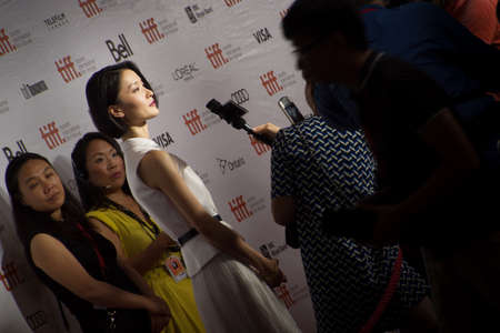 TORONTO - SEPTEMBER 10  Chinese Actress Du Juan arrives at the Toronto International Film Festival for her film  American Dreams in China on September 10, 2013 のeditorial素材
