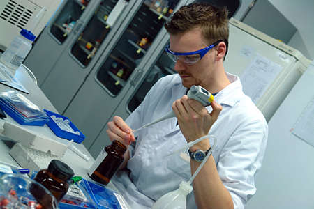 Scientist professor experimenting                               