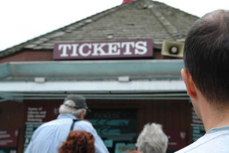 Ticket vendor booth where you can buy tickets for the attraction, movie or theater   