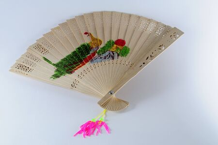decorative fan on a white backgroundの写真素材