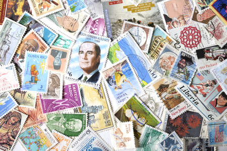 Different postage stamps as backgroundのeditorial素材