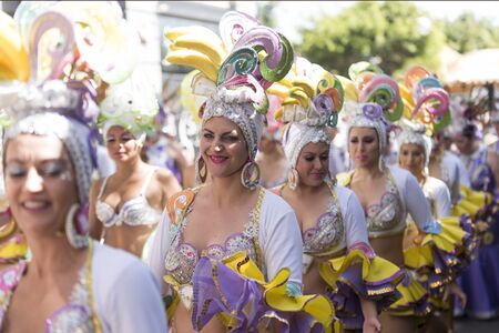 TENERIFE, MARCH 05: Carnival of day, the groups meet with the  people. fun and colorful in the streets. March 05, 2017 Tenerife (Canary Islands) Spainのeditorial素材