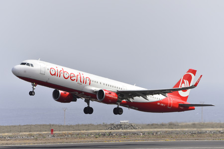TENERIFE, SPAIN-JULY 17, 2017: Aircraft-Airbus A321-211 of Air Berlin (Belair Airlines) Taking off from Tenerife South Airport on July 17, 2017のeditorial素材