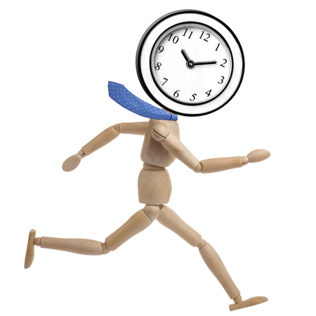 Wooden businessman mannequin running with a wall clock instead of head isolatedの写真素材